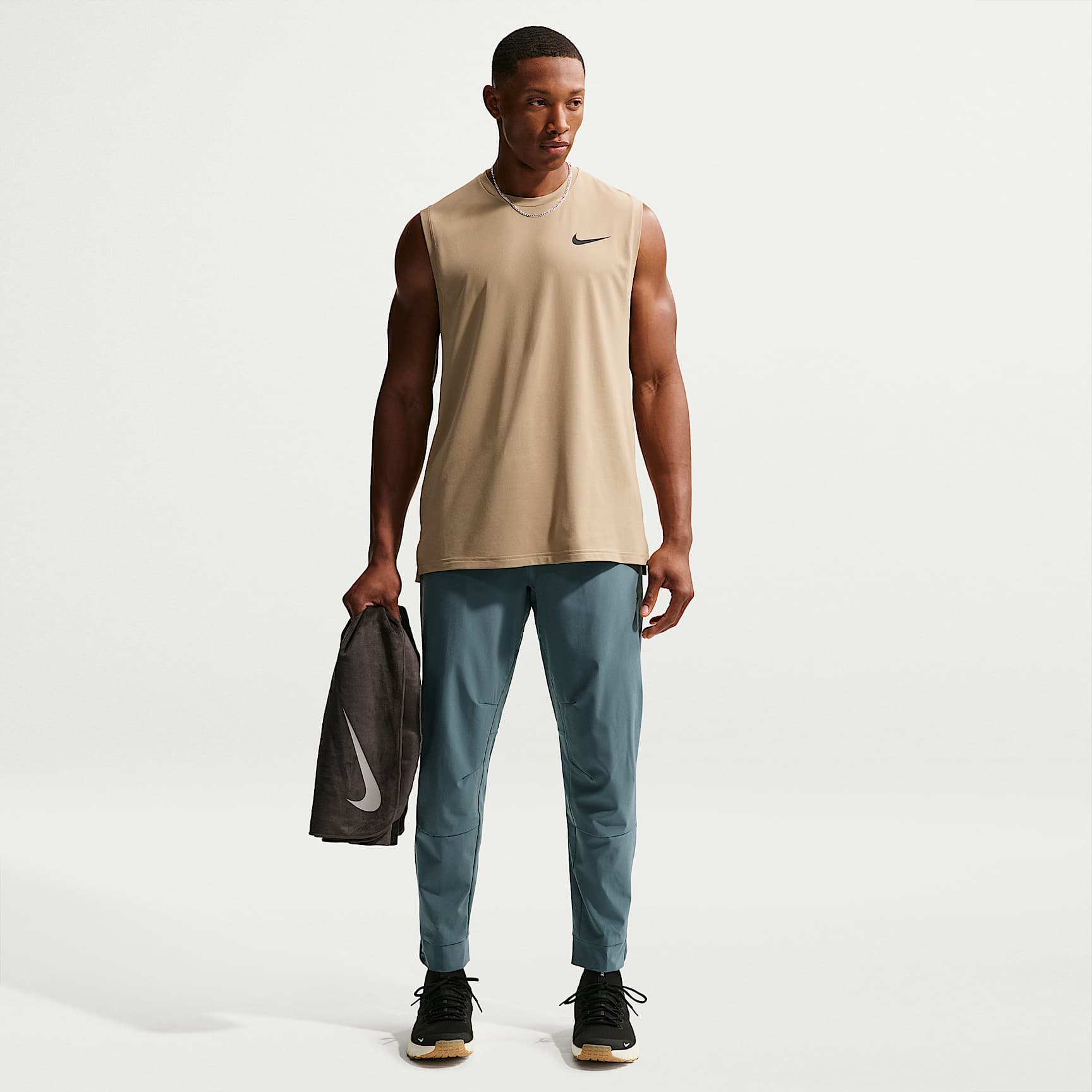 Nike Unlimited Pantalons Dri-FIT versàtils amb cremalleres a les vores - Home