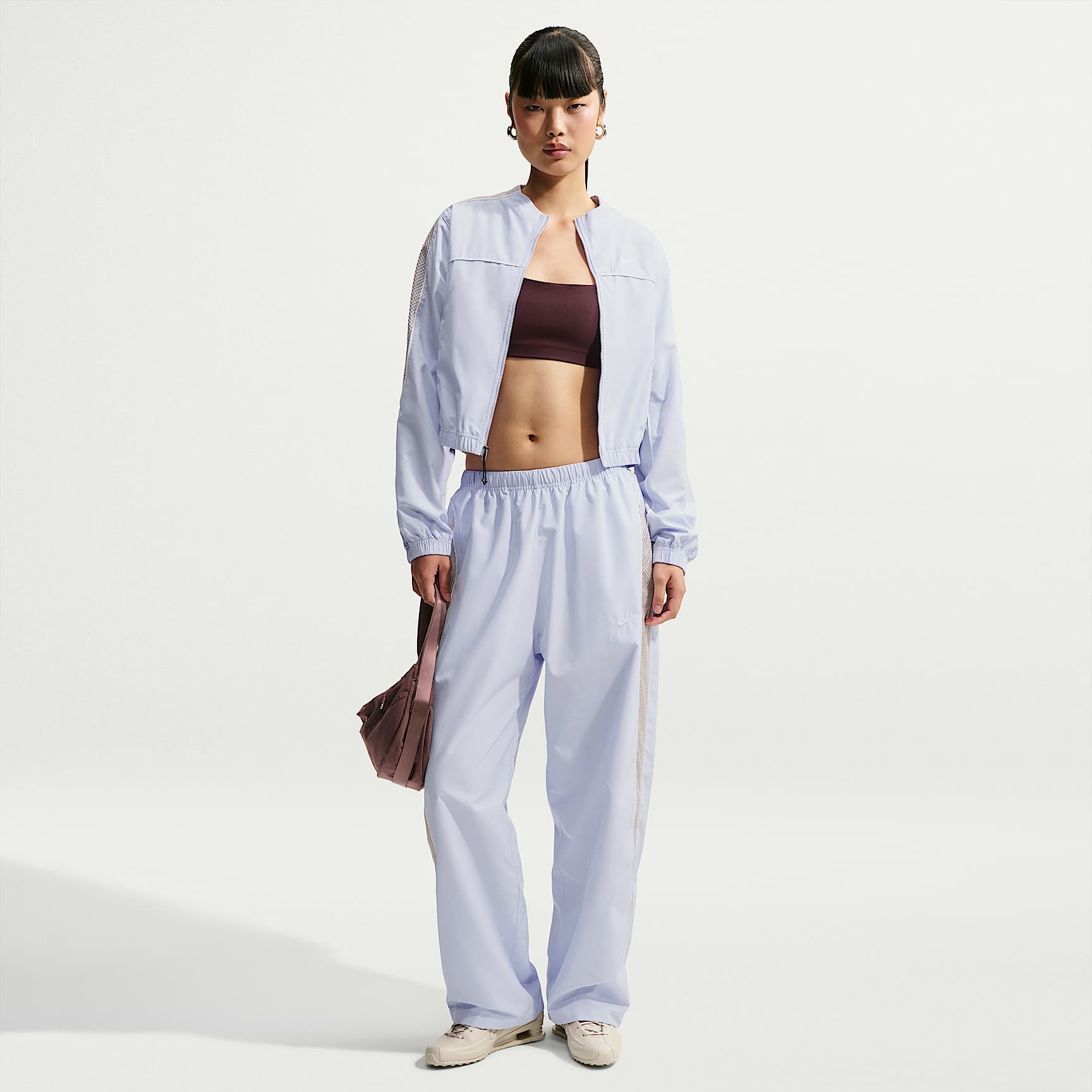 Pants deportivos de tiro alto holgados para mujer Nike Sportswear
