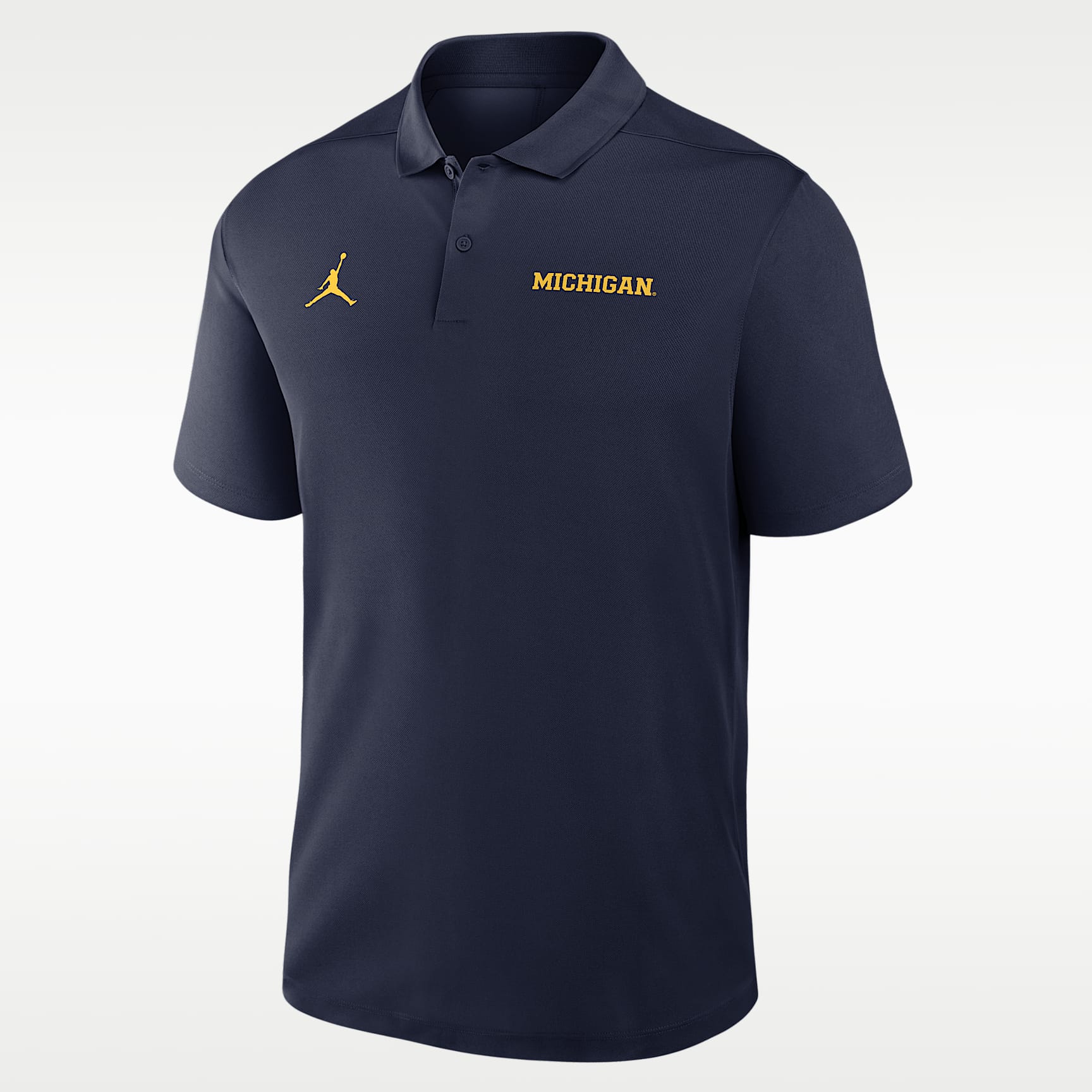 Polo universitaria Nike Dri-FIT para hombre Michigan Victory