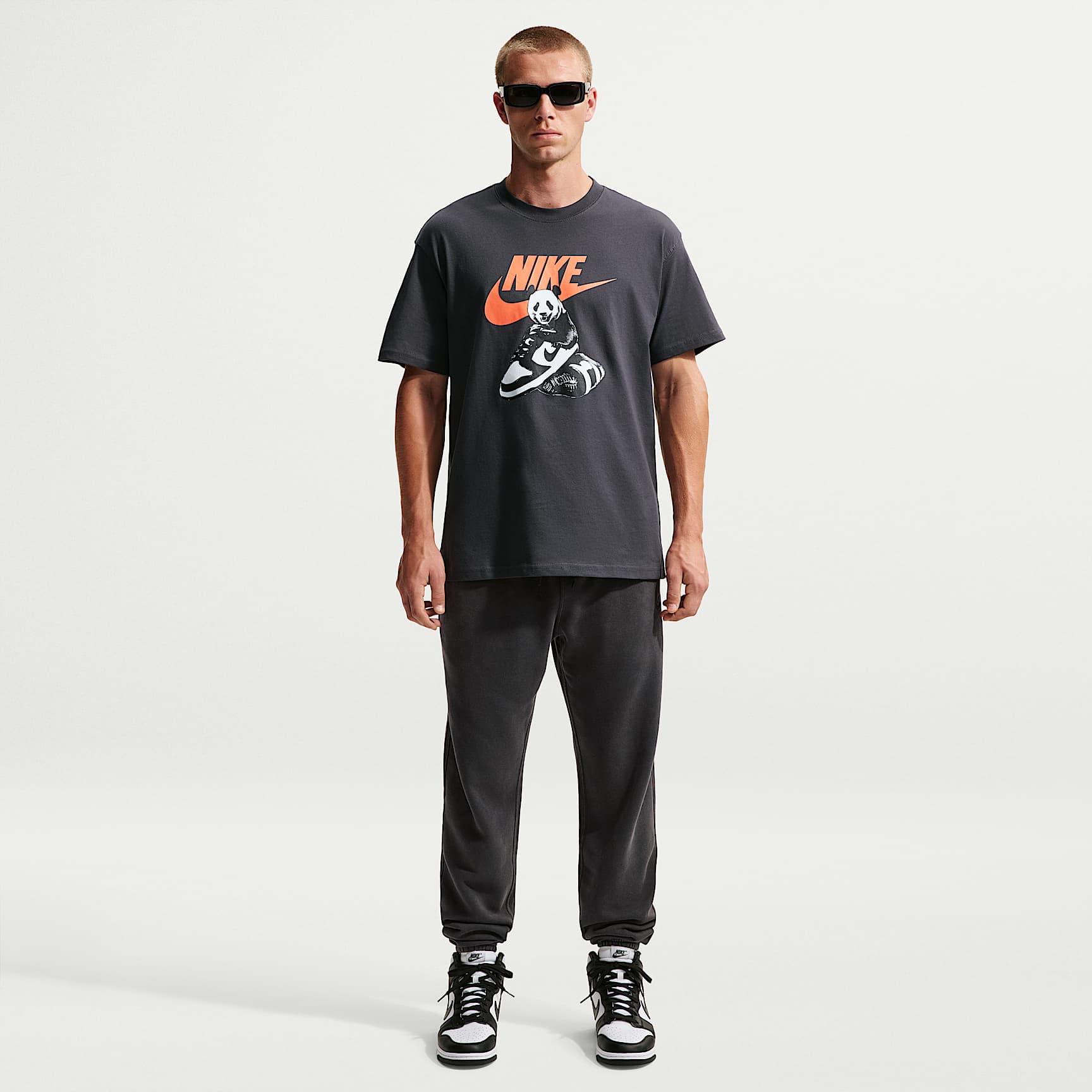 나이키 스포츠웨어 클럽 남성 워싱 커프스 플리스 팬츠