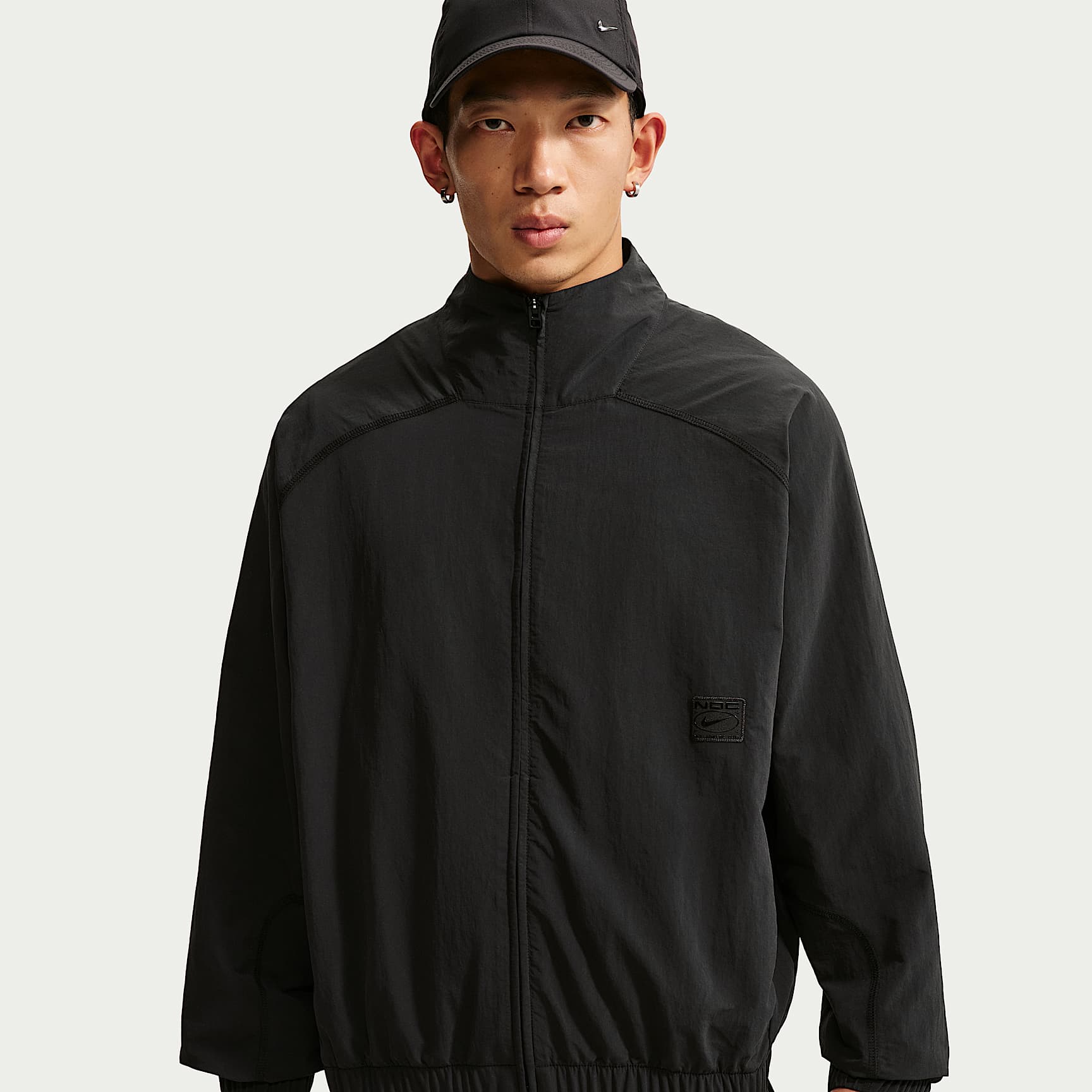 เสื้อแจ็คเก็ตแบบทอซิปยาวขนาดโอเวอร์ไซส์ผู้ชาย Dri-FIT N.A.C. Nike