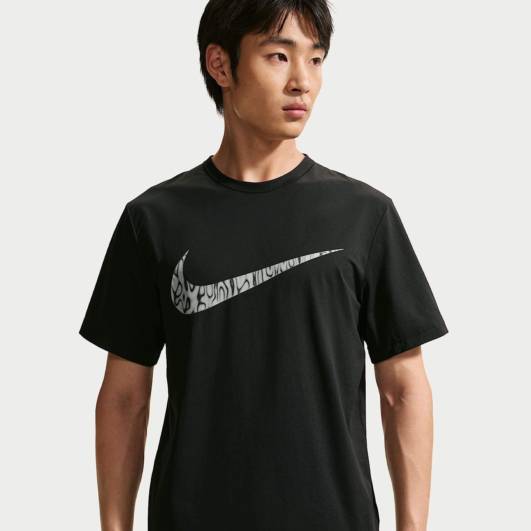 เสื้อยืดเทรนนิ่งป้องกัน UV ผู้ชาย Dri-FIT Nike Hyverse