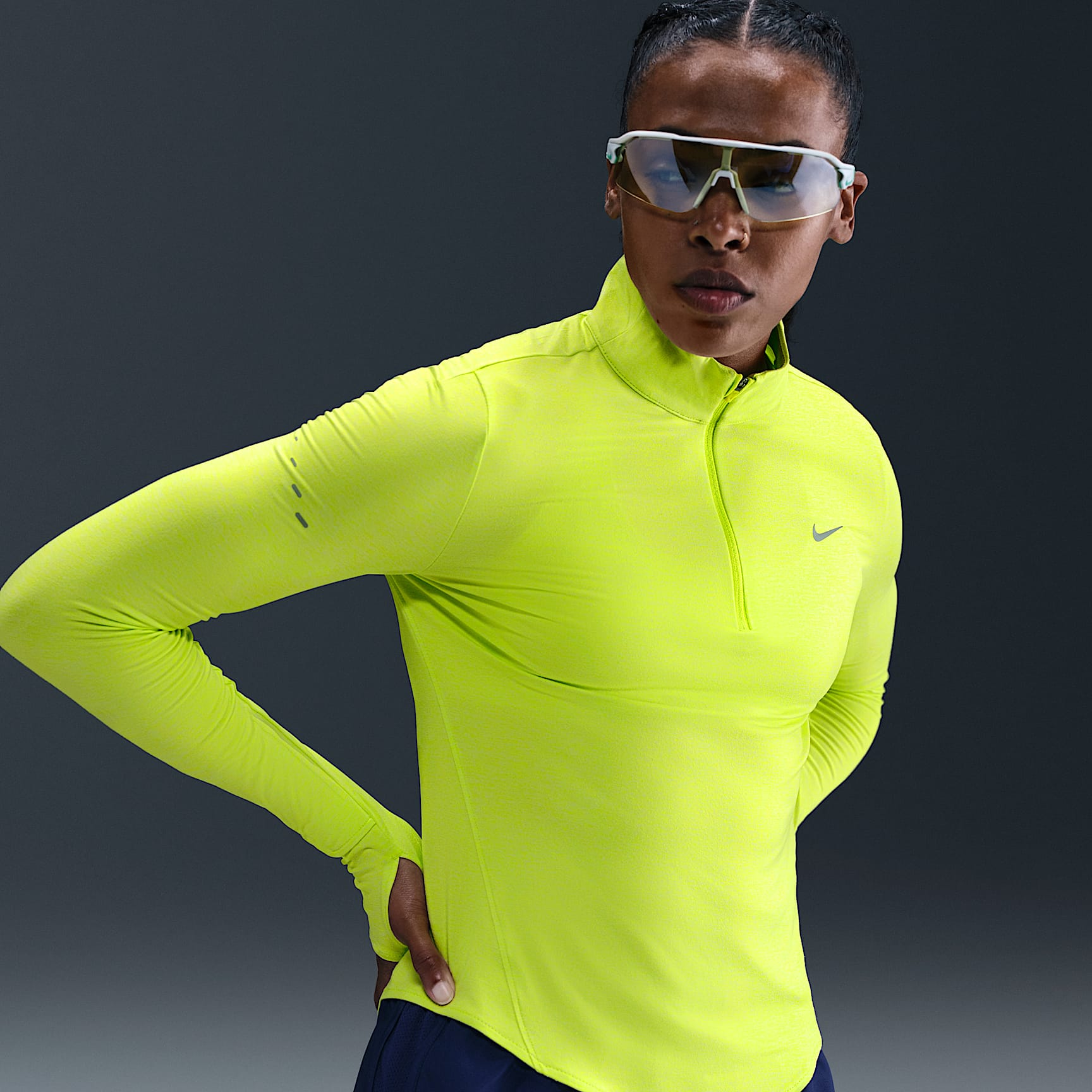 Playera de correr Dri-FIT UV de cierre de 1/4 para mujer Nike Swift