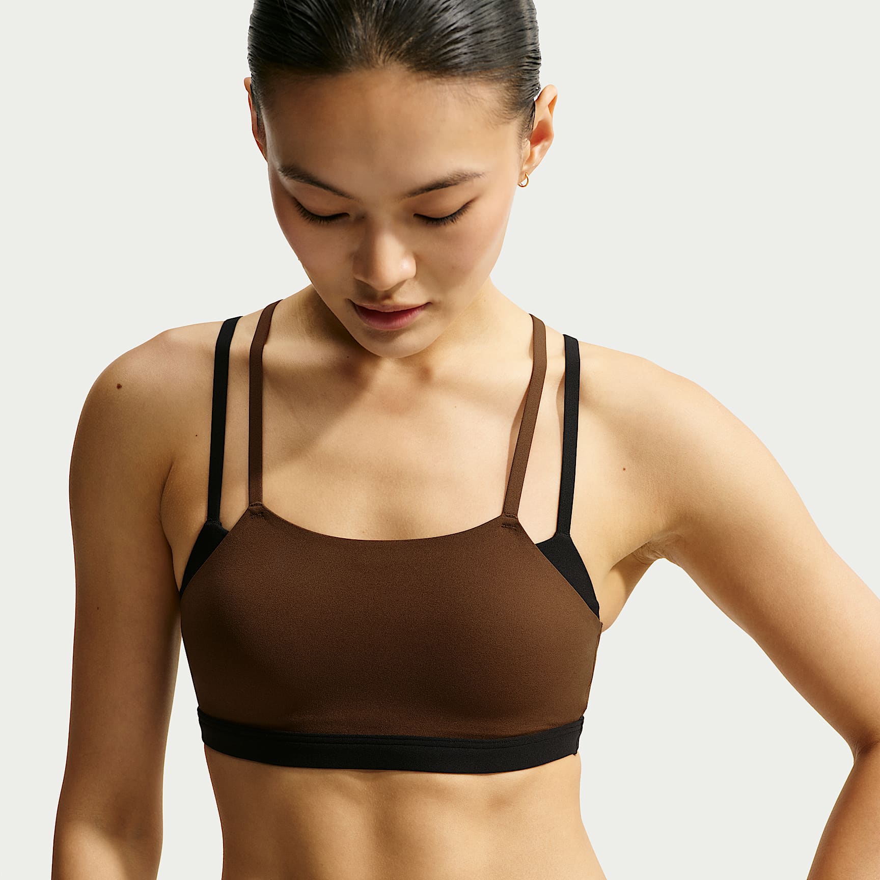 สปอร์ตบราซัพพอร์ตบางเบาเสริมฟองน้ำผู้หญิง Nike Zenvy