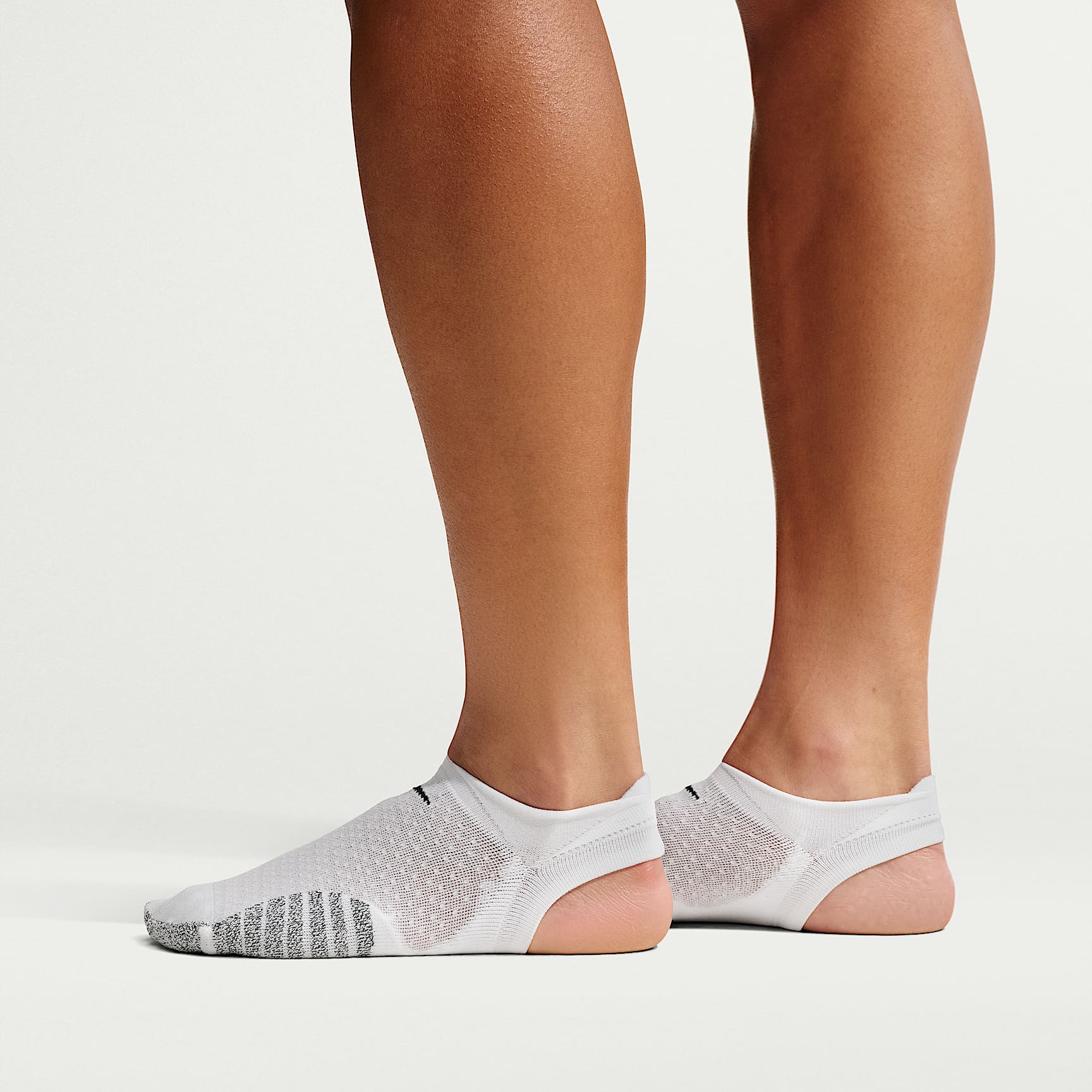 Footie de entrenamiento para mujer NikeGrip Studio