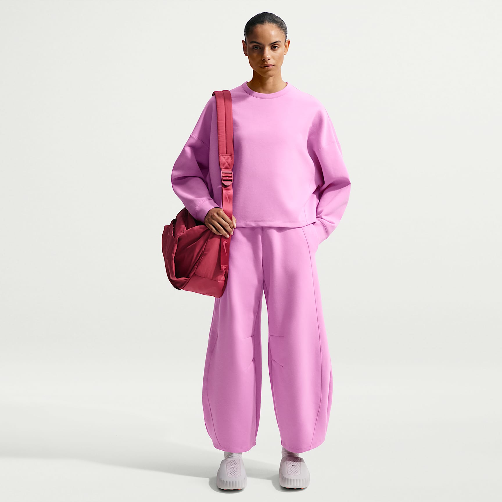 Pants de tiro alto de pierna ancha para mujer Nike 24.7 ImpossiblySoft