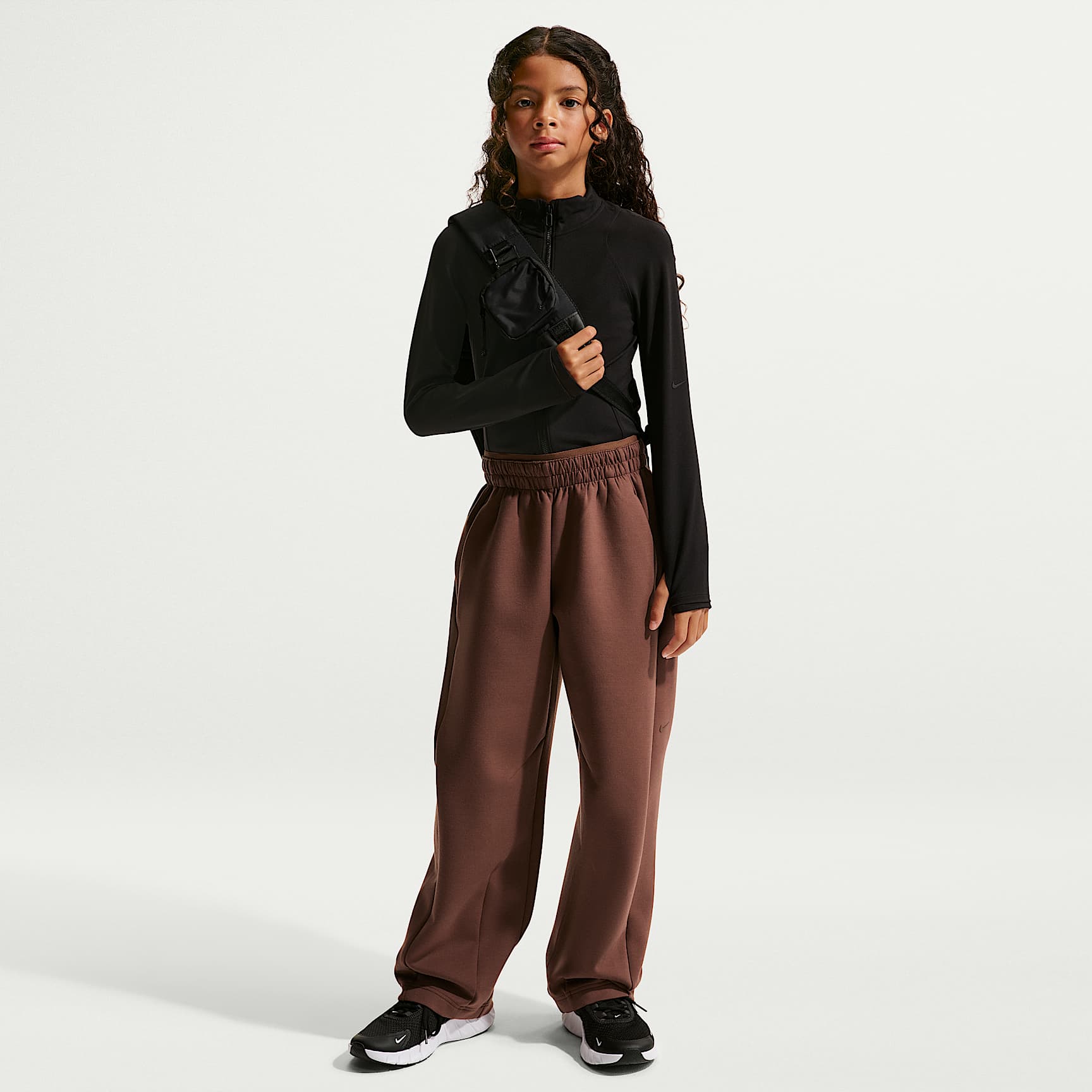 Pants de tejido Knit de tiro alto Therma-FIT para niña Nike Mavn