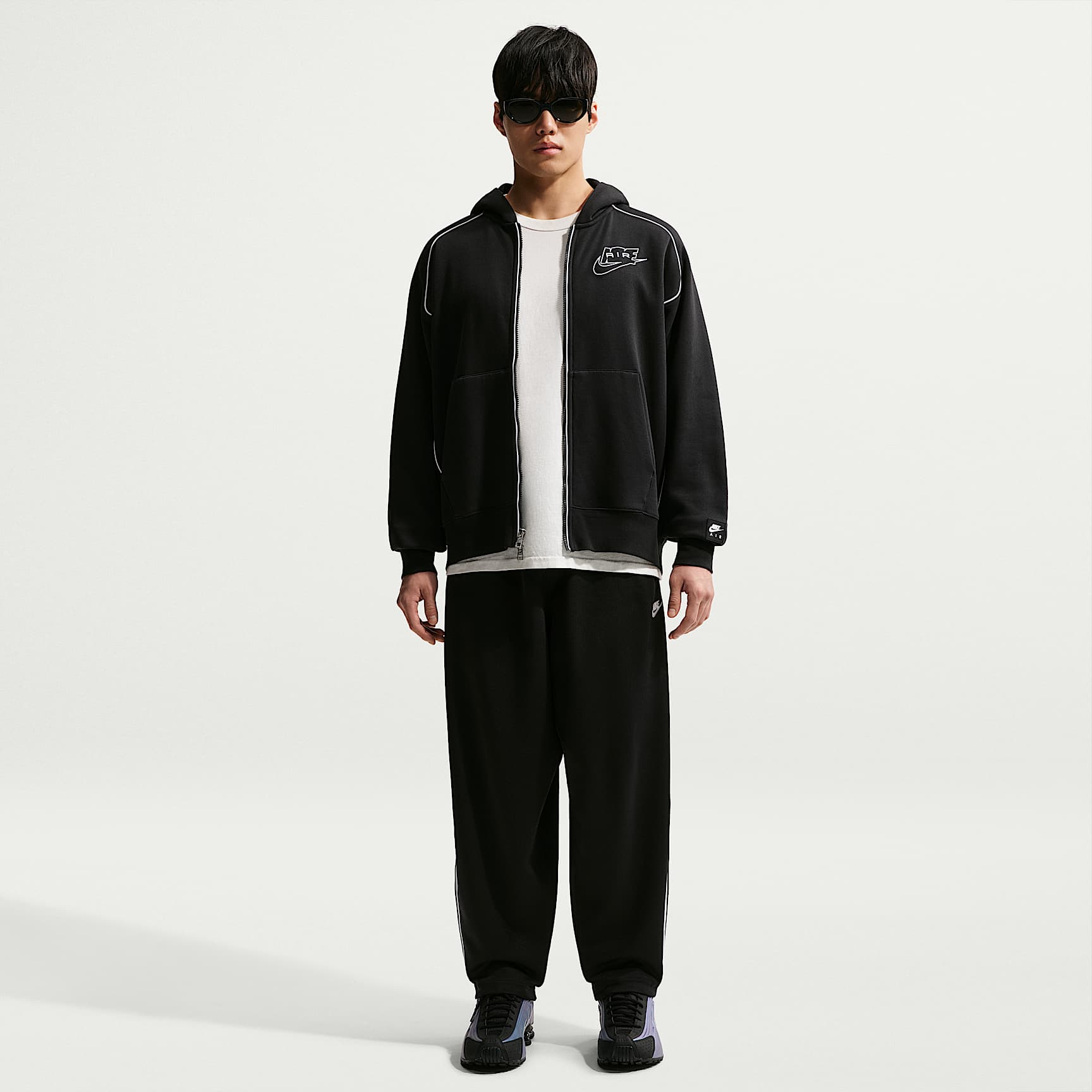 나이키 스포츠웨어 클럽 남성 오버사이즈 니트 트랙 팬츠