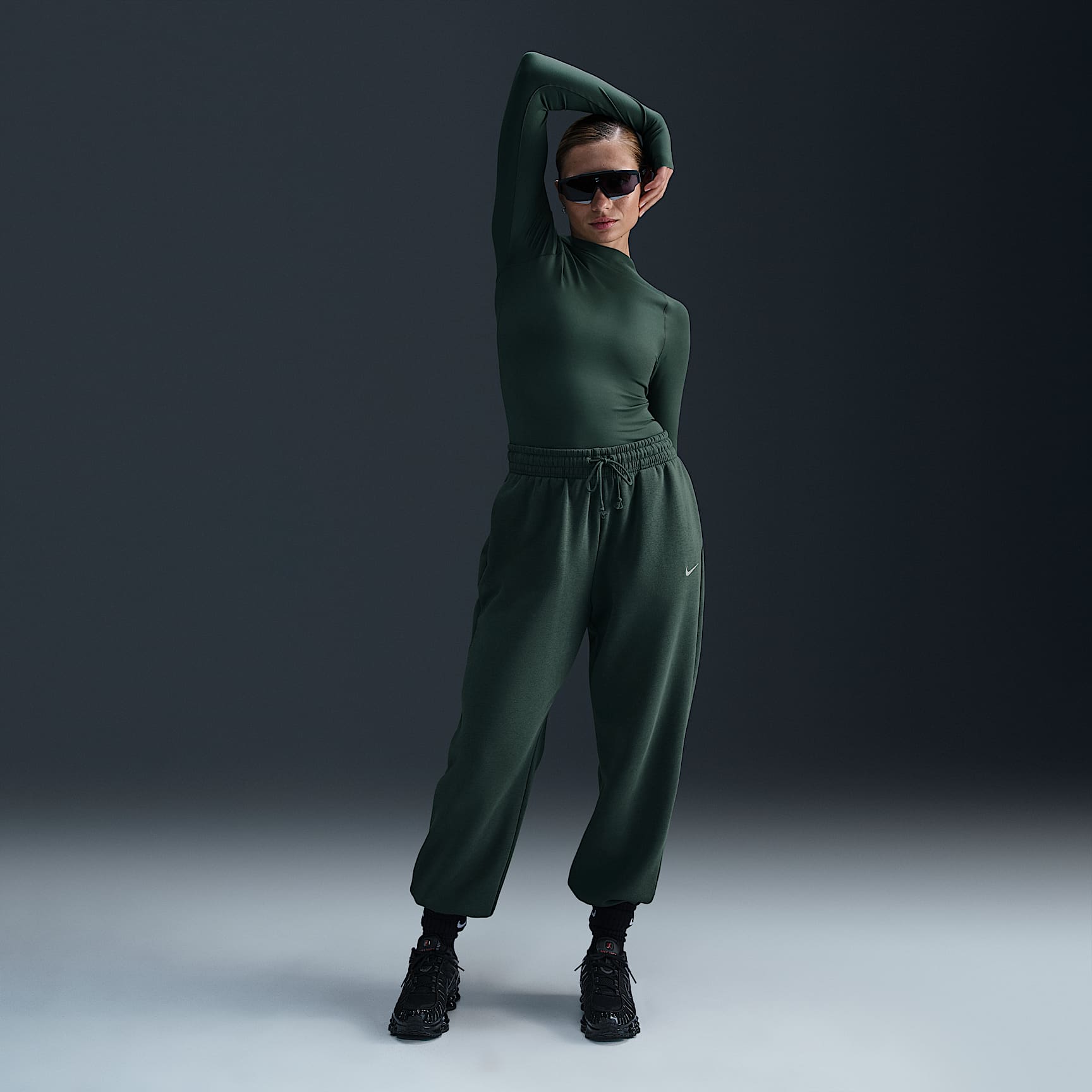 Pants de entrenamiento oversized de tiro alto para mujer Nike Sportswear Phoenix Fleece