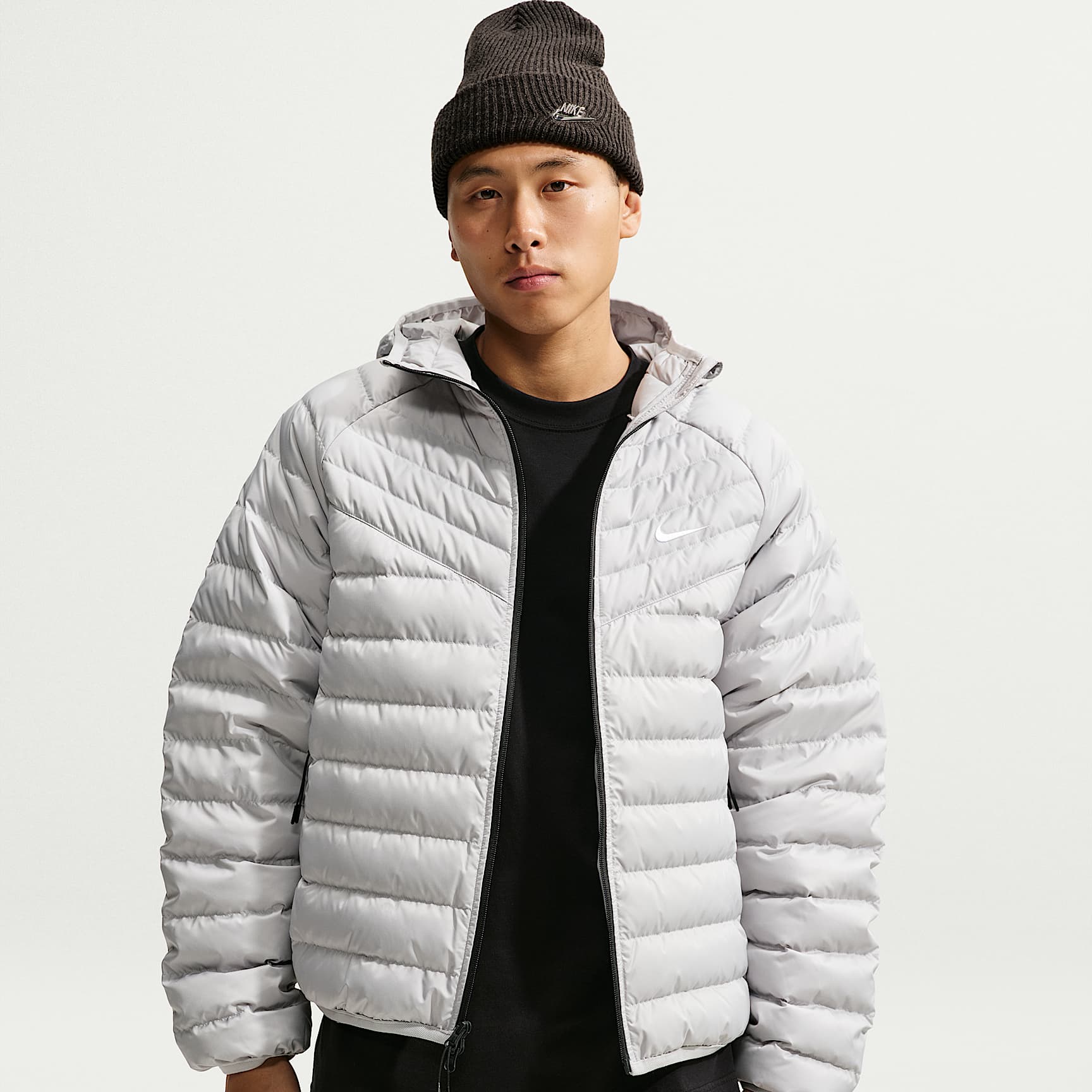 Veste légère en duvet microcanal Nike Windrunner pour homme