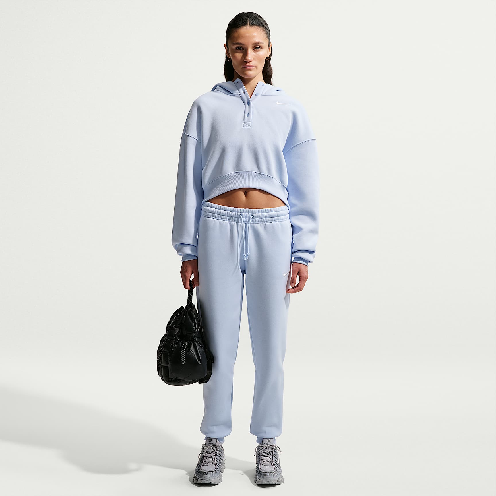 Damskie spodnie dresowe ze średnim stanem Nike Sportswear Phoenix Fleece