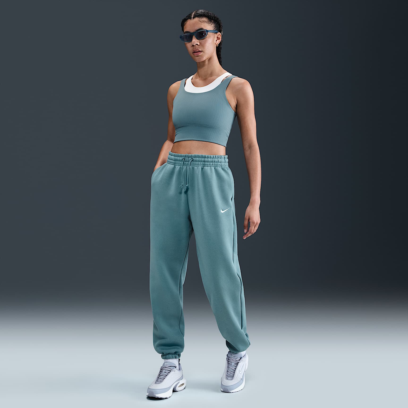 Pants de entrenamiento oversized de tiro alto para mujer Nike Sportswear Phoenix Fleece