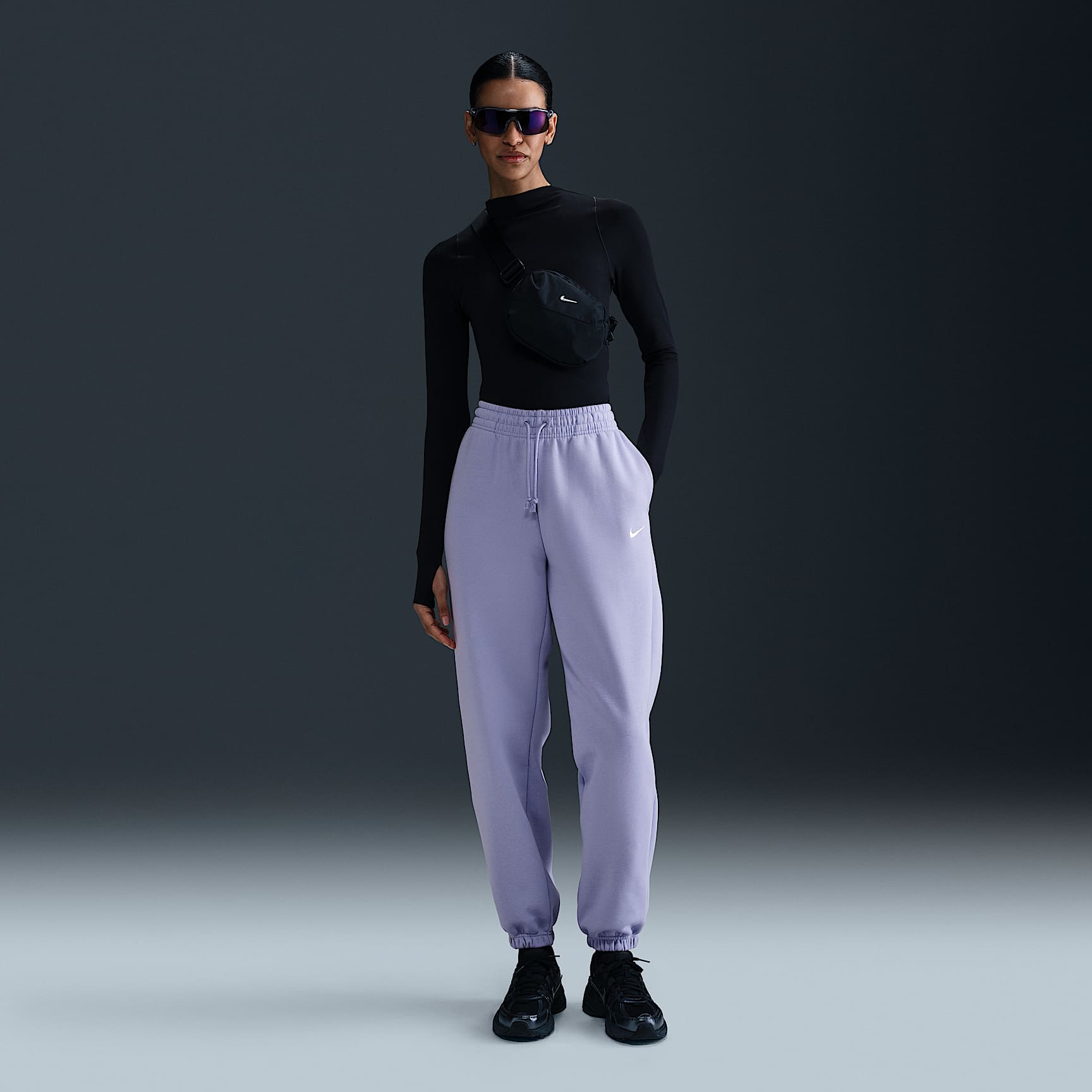 Pants de entrenamiento oversized de tiro alto para mujer Nike Sportswear Phoenix Fleece