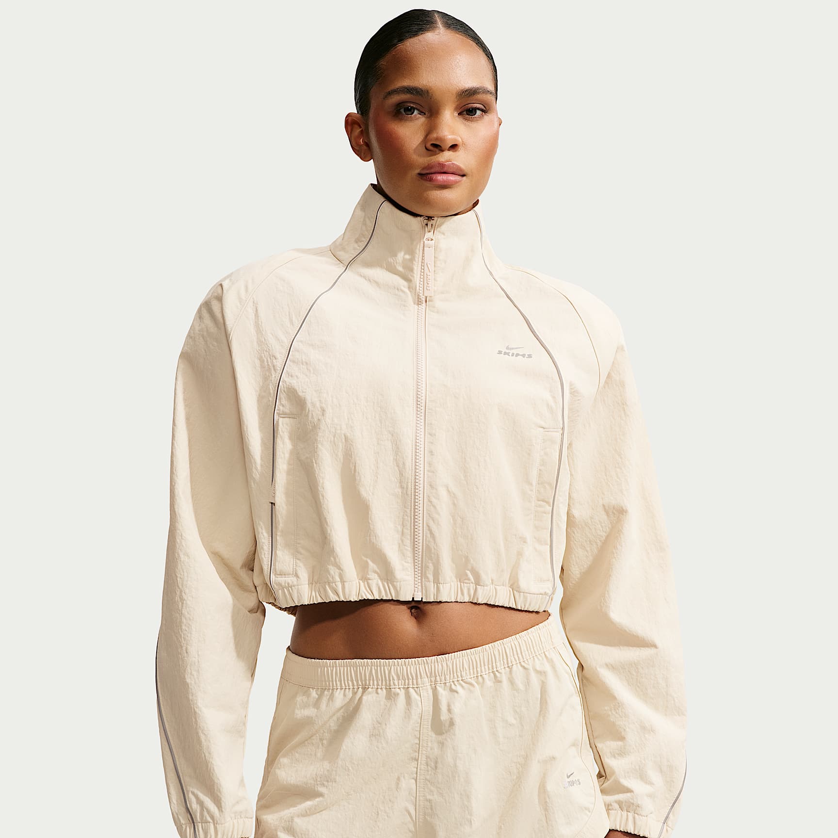 NikeSKIMS Crunchy avkortet damejakke i nylon