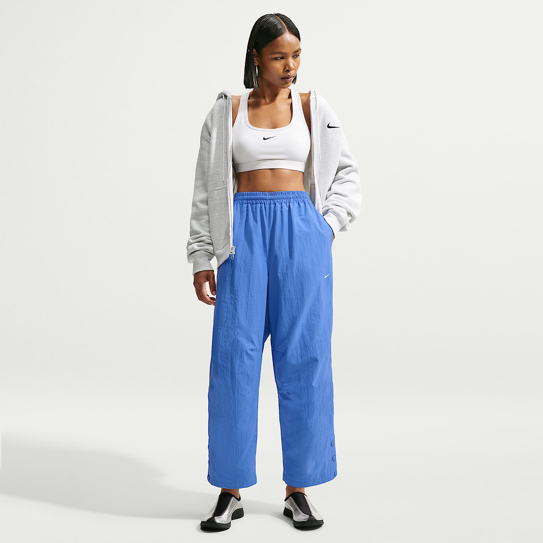 Pants de tejido Woven de tiro alto oversized para mujer Nike Sportswear