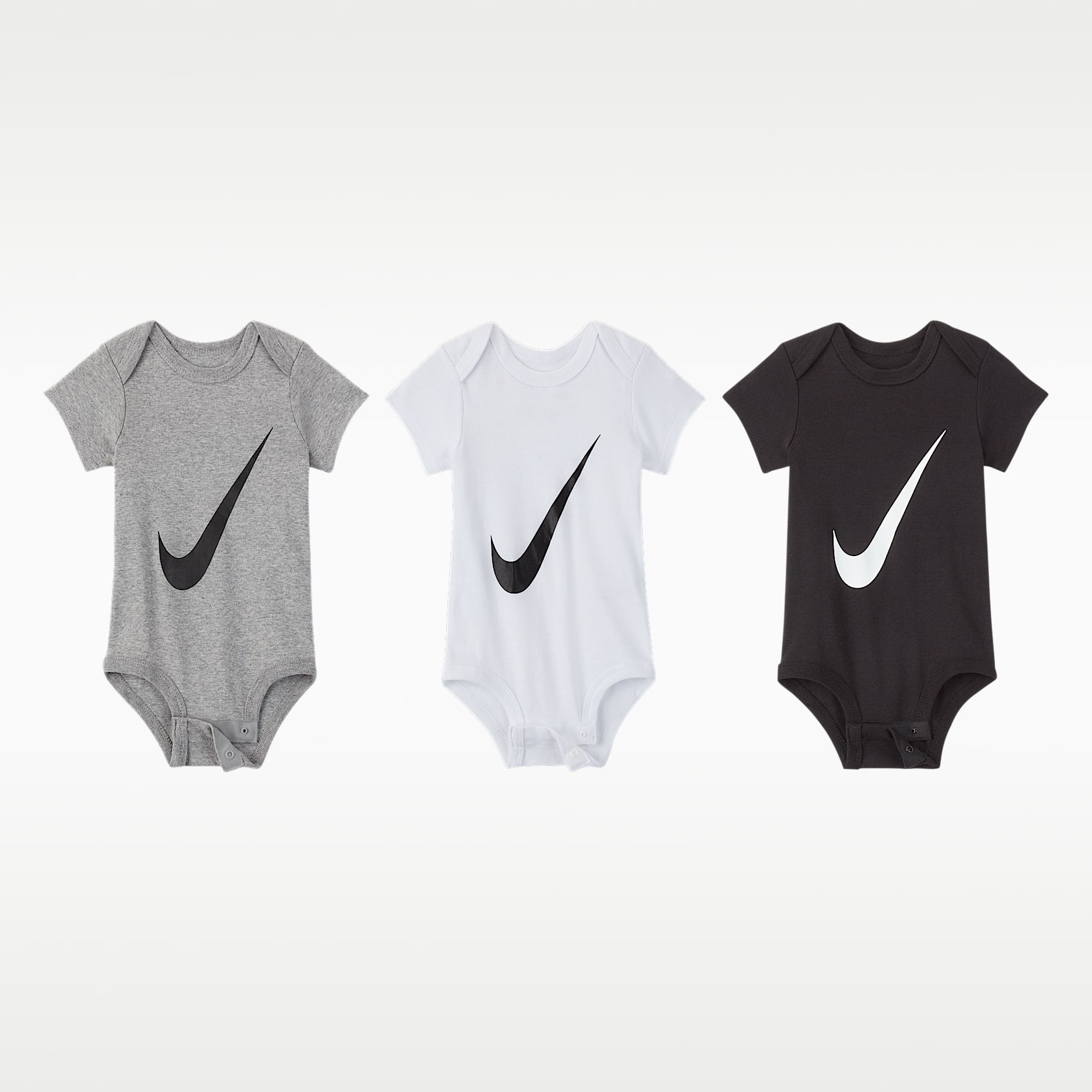Lot de trois bodys Nike pour bébé (0 - 6 mois)