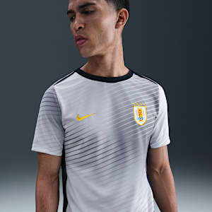 Playera de fútbol de manga corta Nike Dri-FIT para antes del partido para hombre Uruguay Academy Pro