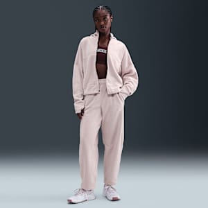 Pants de tejido Fleece Therma-FIT de tiro medio para mujer Nike One