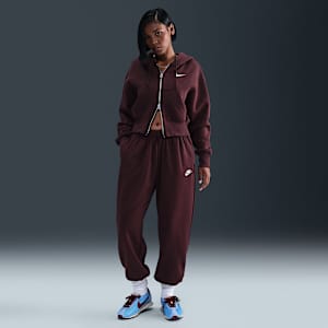 Pants de entrenamiento oversized de tiro medio para mujer Nike Sportswear Club Fleece