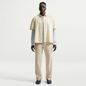 Męskie spodnie z dzianiny z luźnymi nogawkami Nike Club