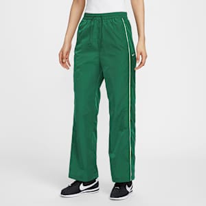 กางเกงขายาวเอวสูงเปิดชายแบบทอผู้หญิง Nike Windrunner