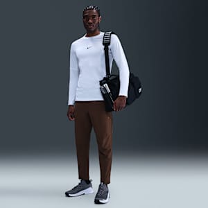 Pants versátiles Dri-FIT de pierna entallada para hombre Nike Unlimited