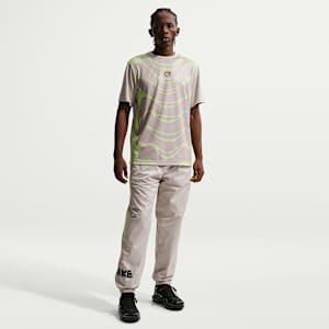 Ανδρικό υφαντό παντελόνι με σχέδιο Nike Windrunner