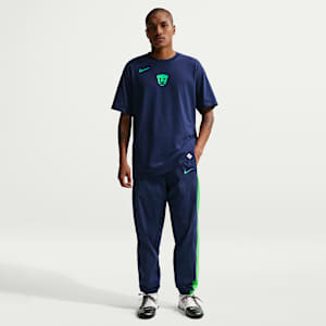 Pants deportivos de fútbol Nike Total 90 de tejido Woven para hombre Pumas UNAM Third