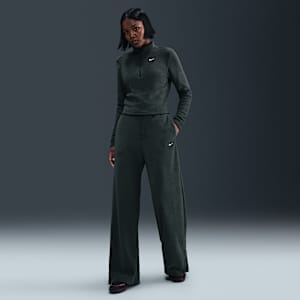 Pants de tejido Fleece cálidos de piernas anchas y tiro alto para mujer Nike Sportswear Phoenix Plush