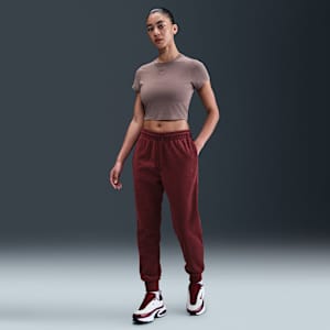 Pants de tejido Fleece de tiro medio cómodos para mujer Nike Sportswear Phoenix Plush