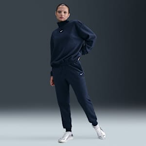 Pants de tejido Fleece de tiro medio cómodos para mujer Nike Sportswear Phoenix Plush