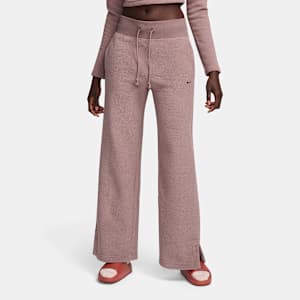 Pants de tejido Fleece cálidos de piernas anchas y tiro alto para mujer Nike Sportswear Phoenix Plush