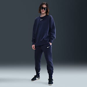 Pants de entrenamiento de tiro medio para mujer Nike Sportswear Phoenix Fleece