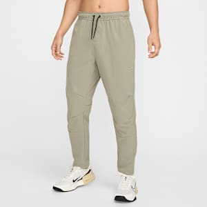 Pants versátiles Dri-FIT de pierna entallada para hombre Nike Unlimited
