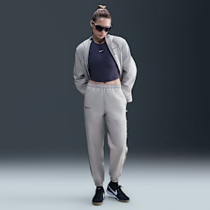 FC Barcelona Essential Repel Women's Nike Football Mid-Rise Woven Joggers