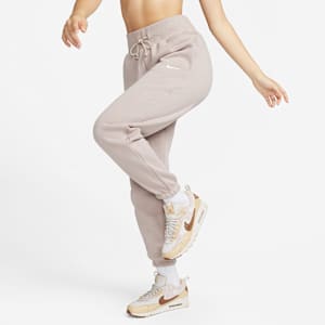 Pants de entrenamiento oversized de tiro alto para mujer Nike Sportswear Phoenix Fleece