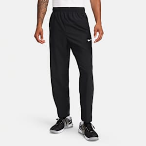 Pants Dri-FIT versátiles con dobladillo abierto para hombre Nike Form