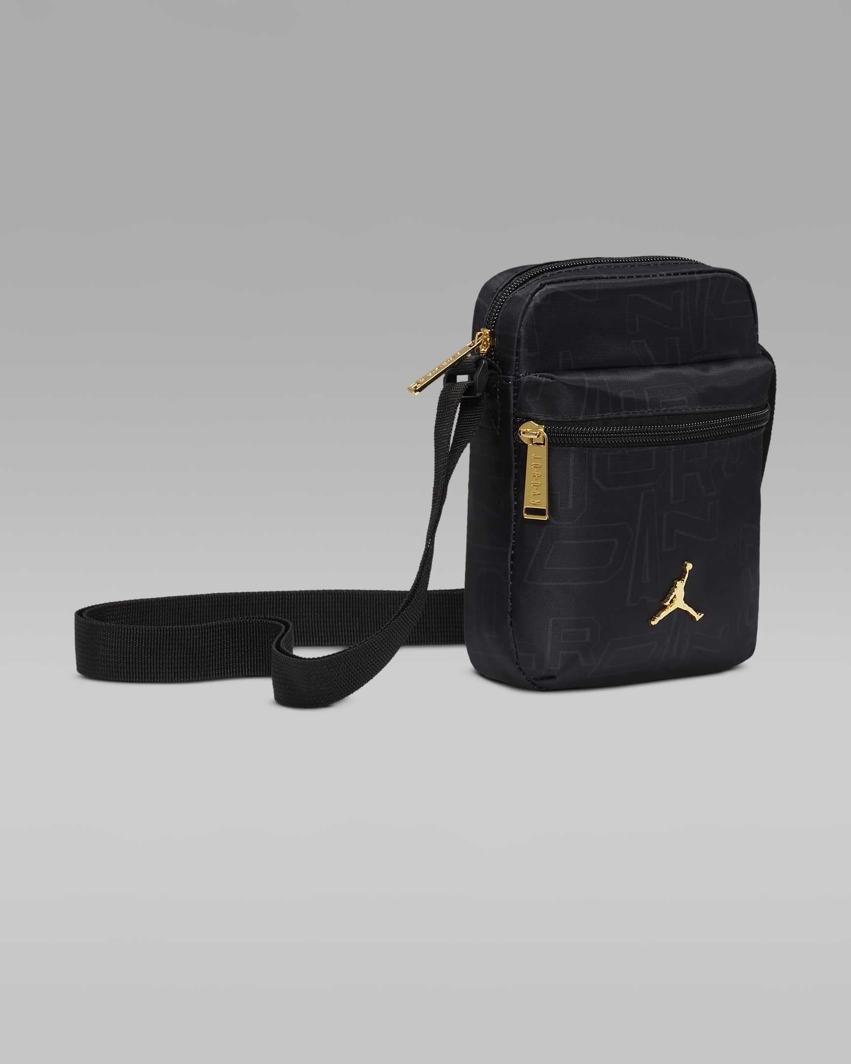 Jordan Black and Gold Festival Bag (1L). Nike UK