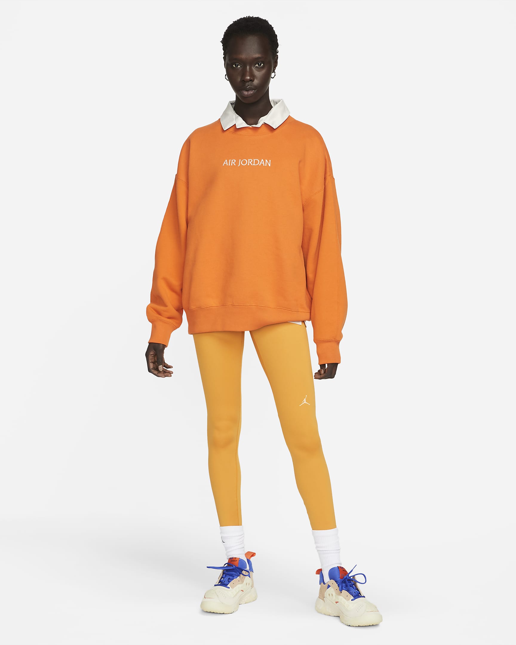 Air Jordan Women's Crew Sweatshirt. Nike PT