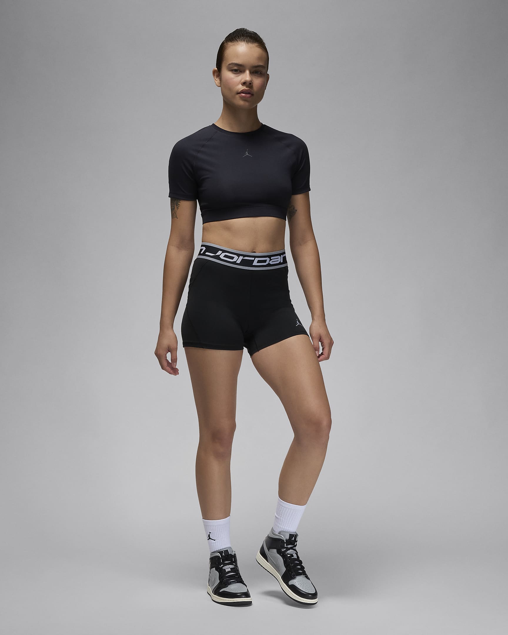 Top ad alte prestazioni stile body Jordan Sport – Donna - Nero/Off Noir