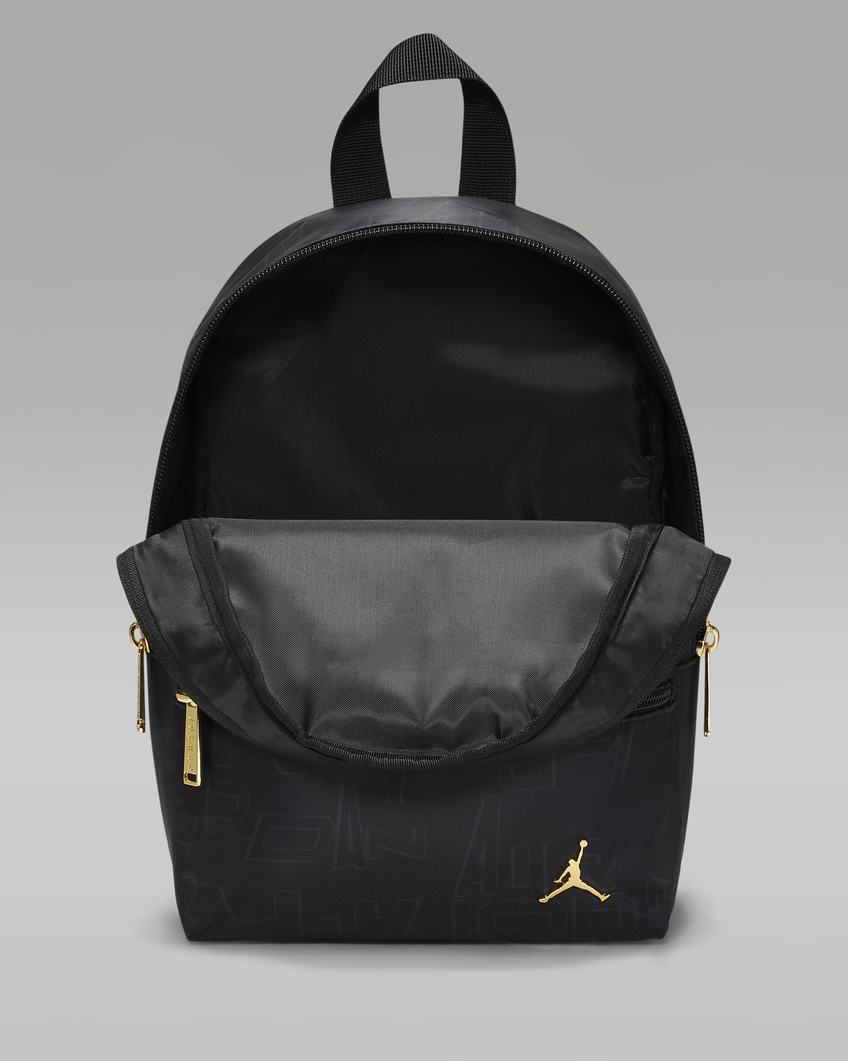 Mochila Jordan Black and Gold Mini Backpack (10 L). Nike.com