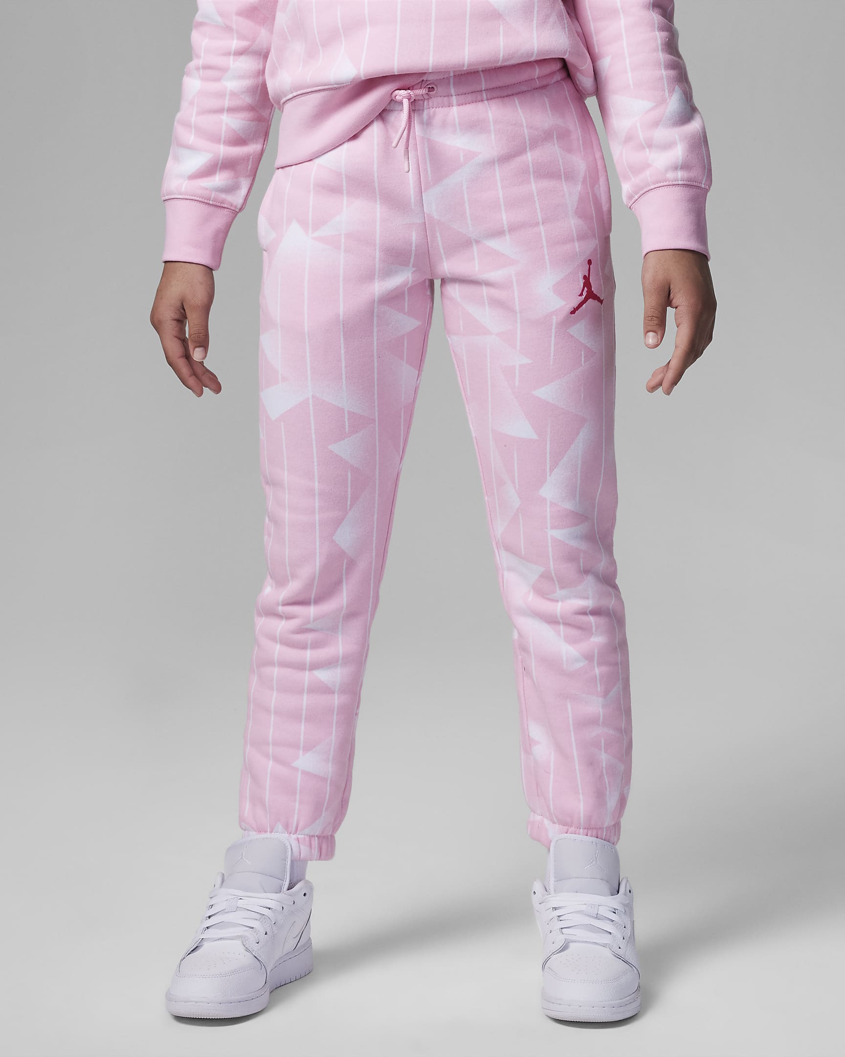Save 18% on Jordan Essentials Printed Fleece Pants Big Kids Pants @ Nike US