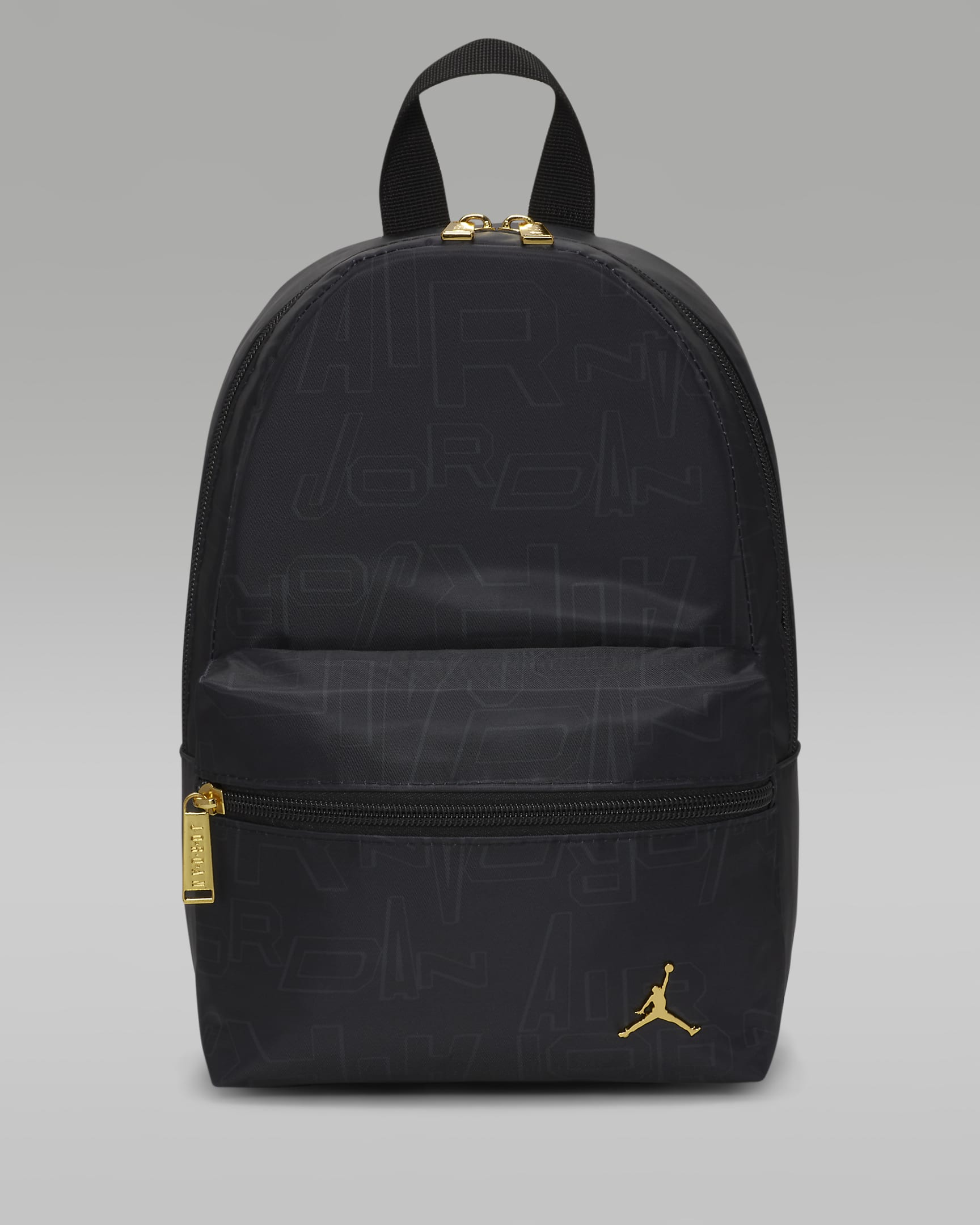 Jordan Black and Gold Mini Backpack Rucksack (10 l). Nike AT