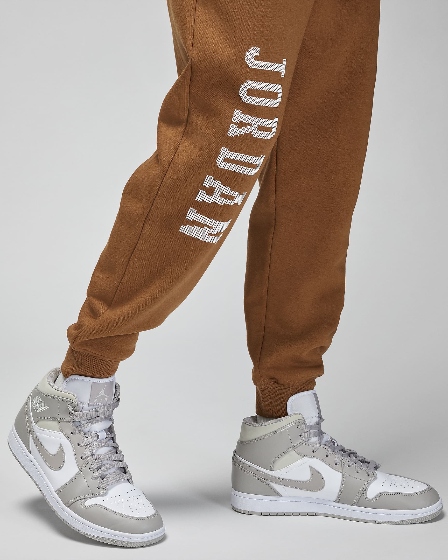 Jordan Essentials Holiday Men's Fleece Pants. Nike JP
