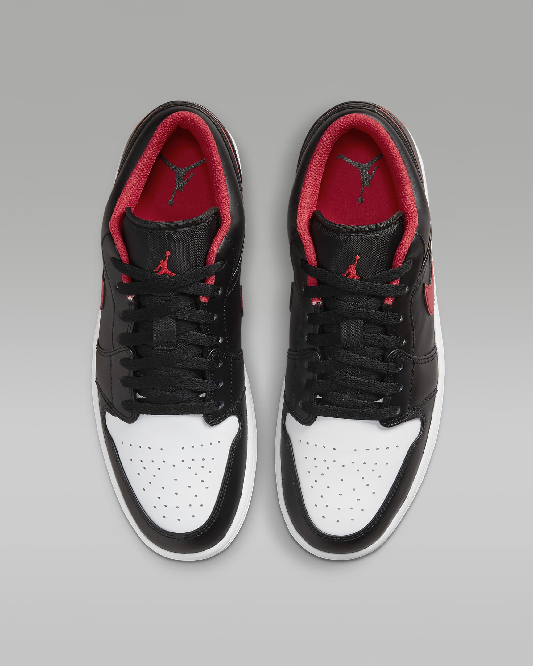 Chaussure Air Jordan 1 Low pour Homme - Noir/Blanc/Fire Red