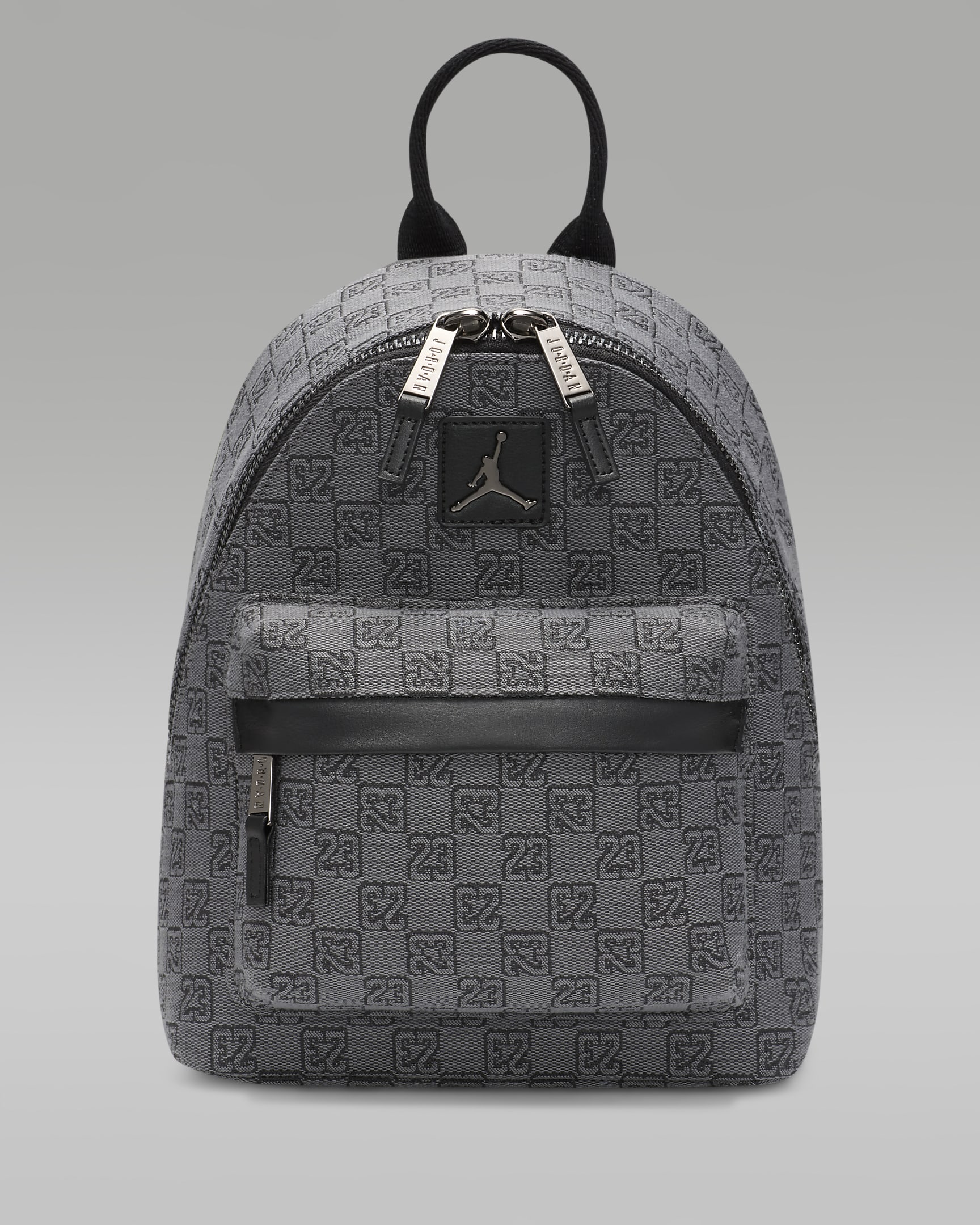 Jordan Monogram Mini Backpack Backpack. Nike CZ
