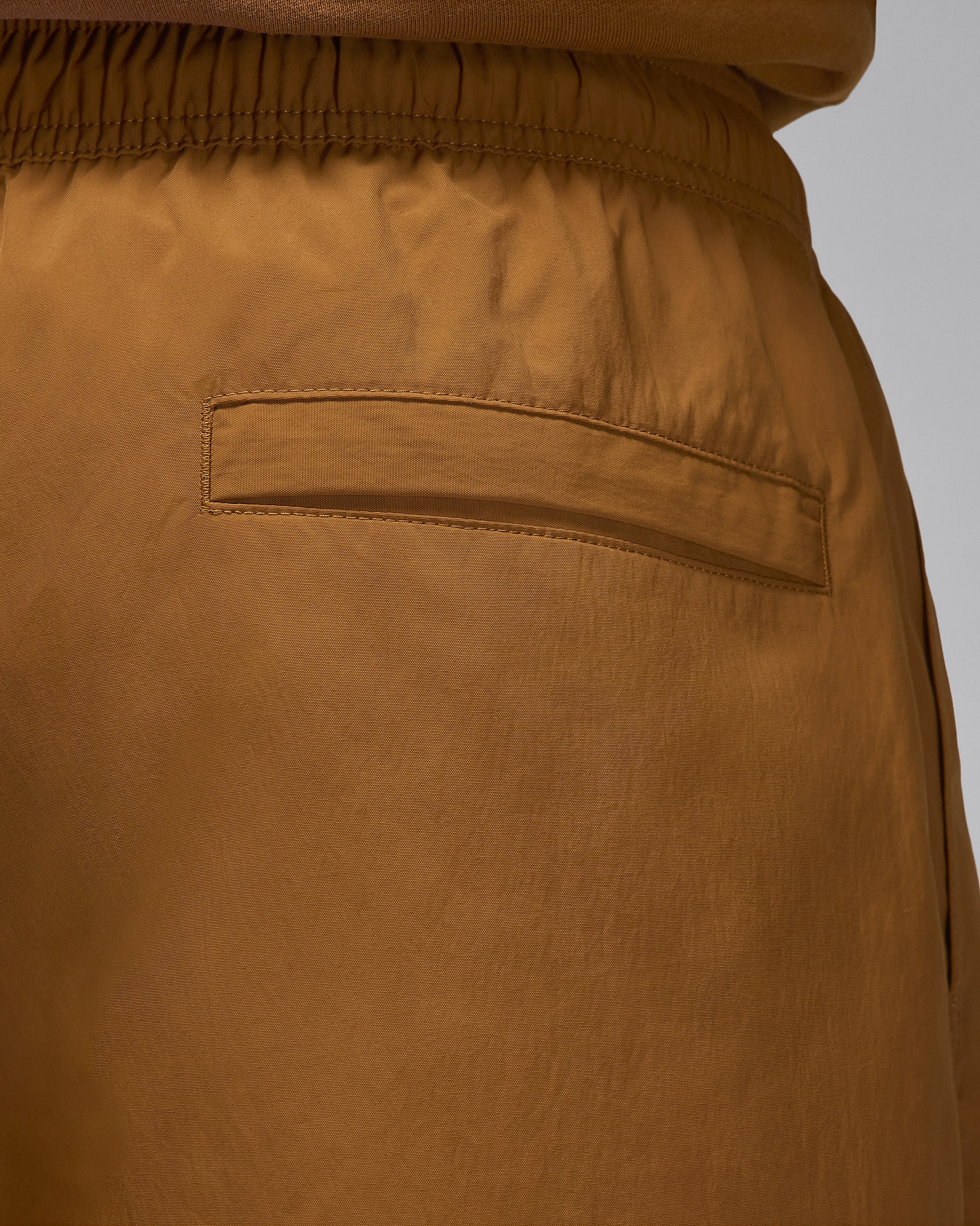 Pantaloni in tessuto Jordan Essentials – Uomo - Desert Bronze