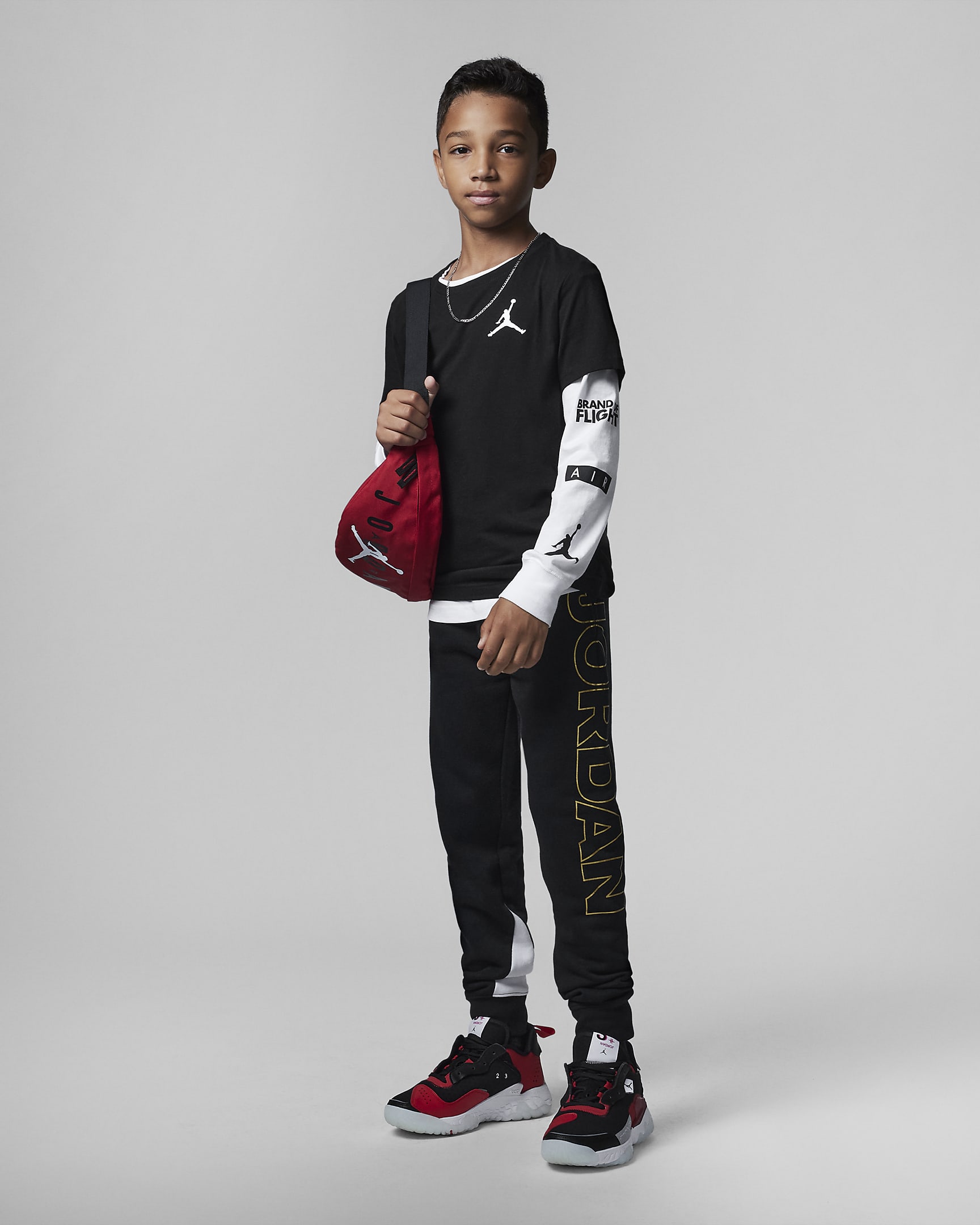 Jordan Holiday Shine Fleece Pants Big Kids' Pants. Nike JP