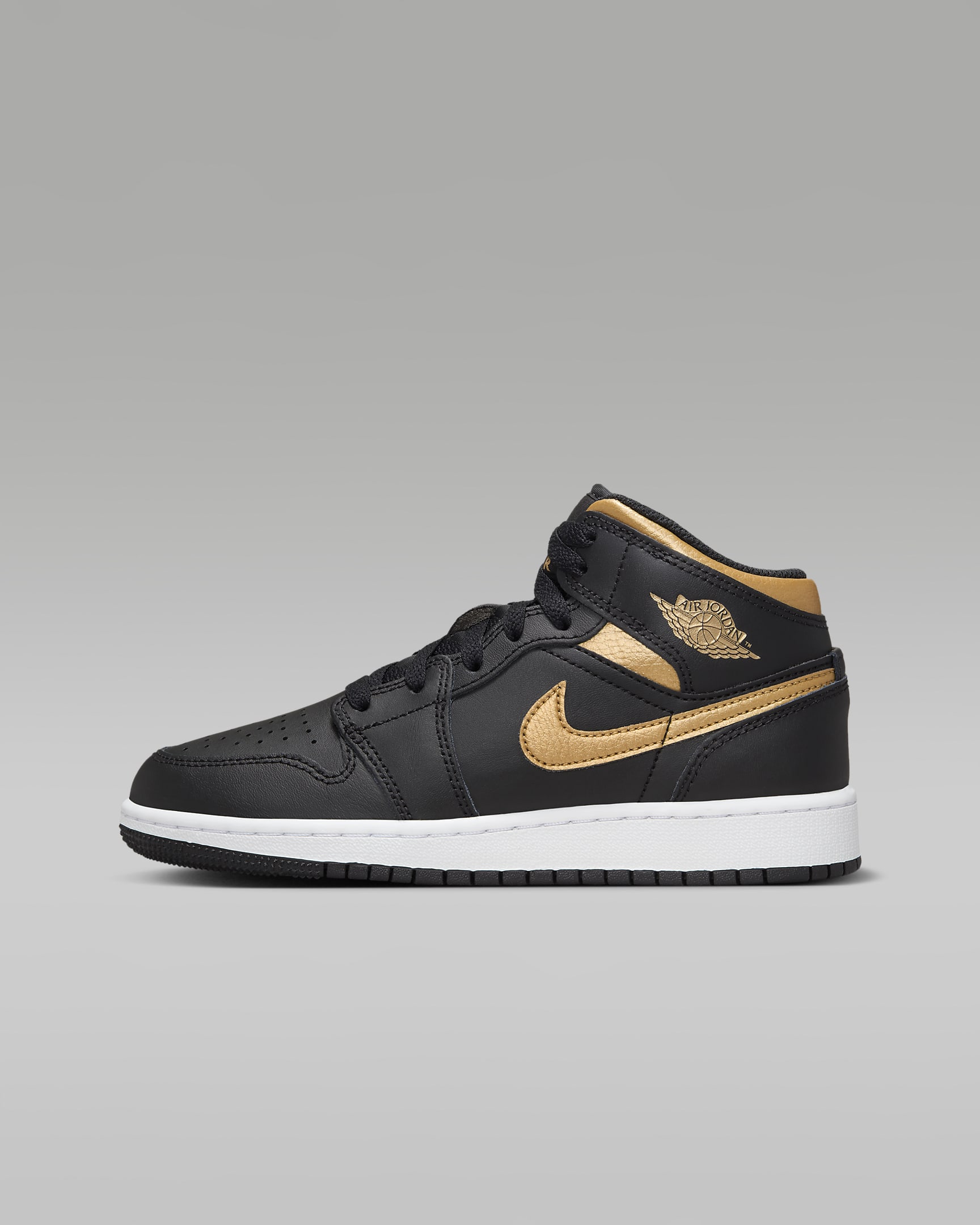 Air Jordan 1 Mid-sko til større børn - sort/hvid/Metallic Gold