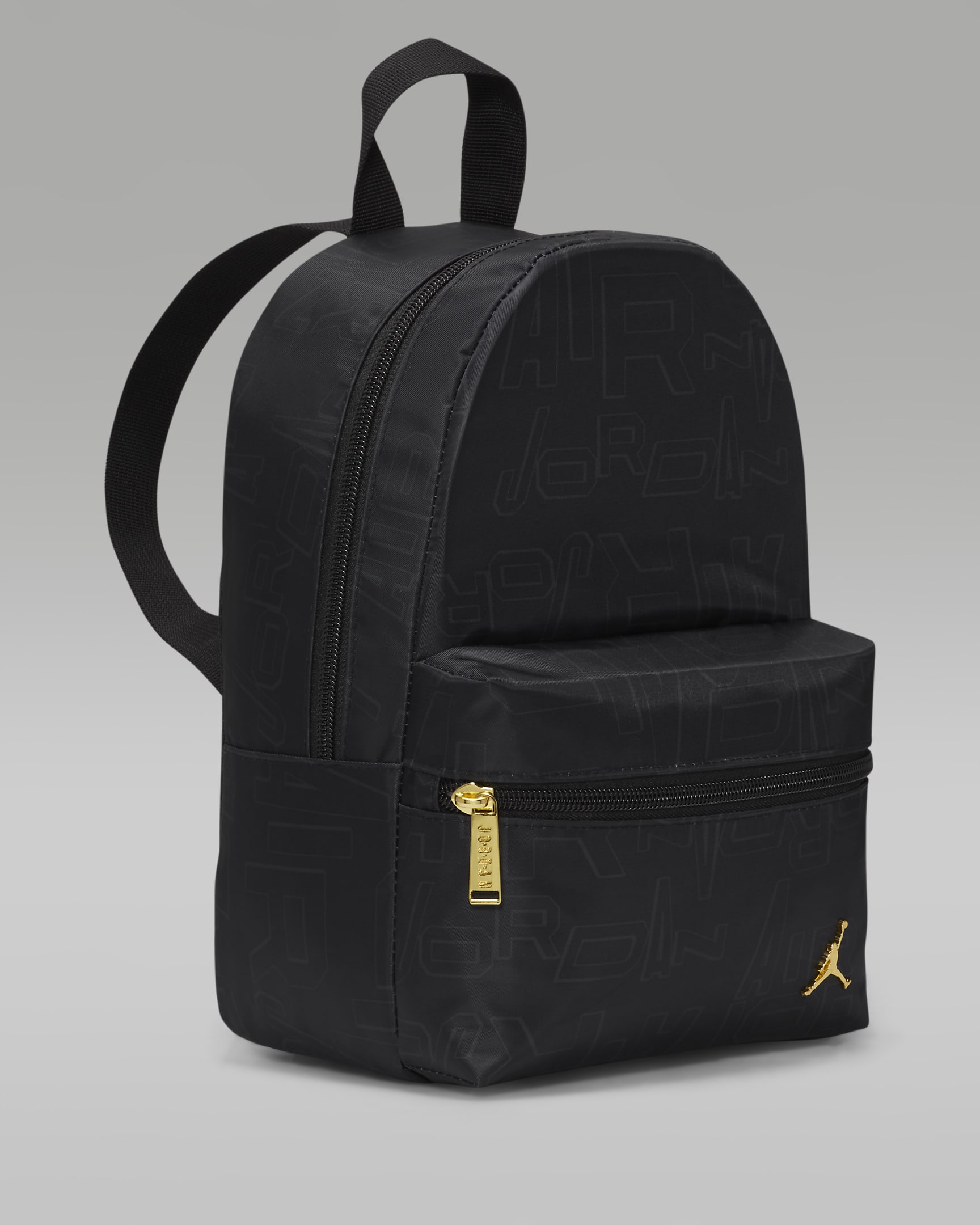 Jordan Black and Gold Mini Backpack Backpack (10L). Nike UK